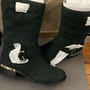Black Vince Camuto boots with gold accents.